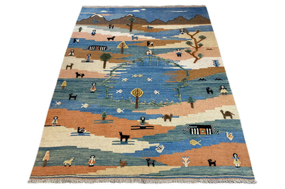 Kilim Qashqai rug: angled view with landscape motifs and colorful animal figures on a blue field