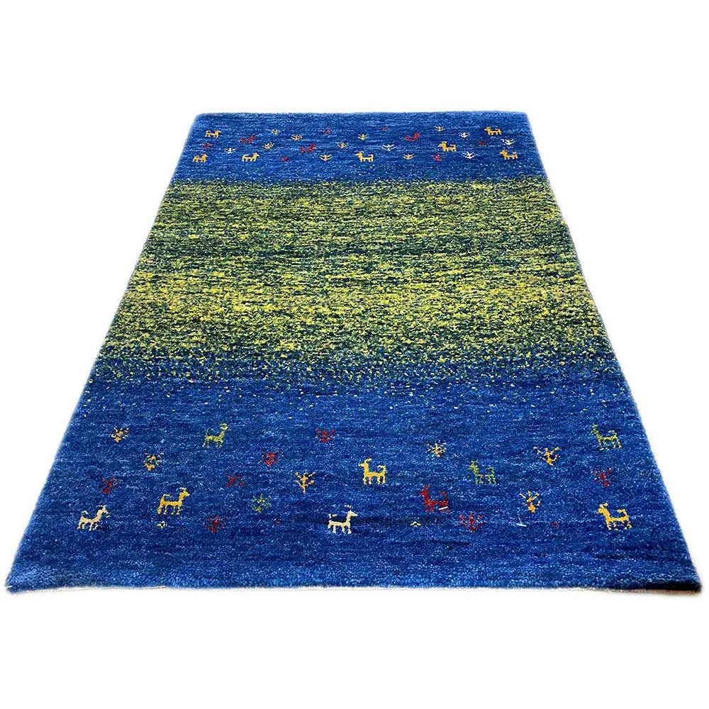 Gabbeh carpet Lori (85x61 cm): blue-green carpet with colorful animal motifs, flat-weave