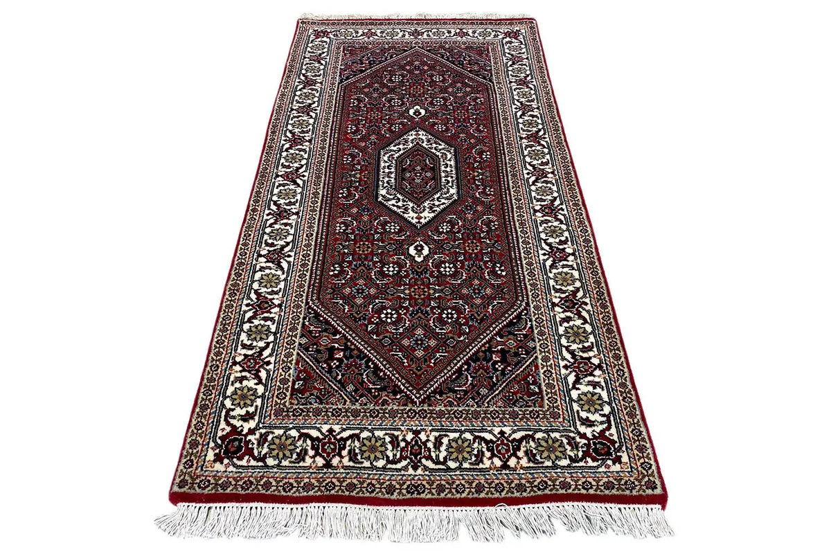 Bidjar rug 144x71 cm with a detailed border pattern in red, blue, and beige