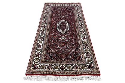 Bidjar rug 144x71 cm with a detailed border pattern in red, blue, and beige