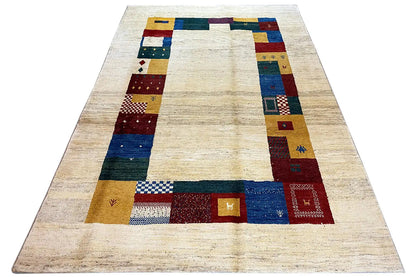 Gabbeh rug 305x200 cm, top view: cream-colored central area with patchwork border