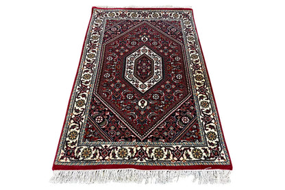 Bidjar rug 93x62 cm, red pattern with a central field and fringes along the edge
