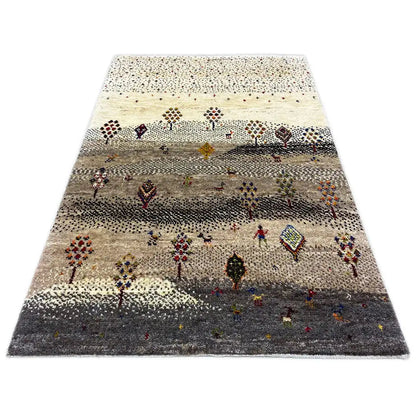 Gabbeh rug, decorative band with colorful symbols and figures on a beige background