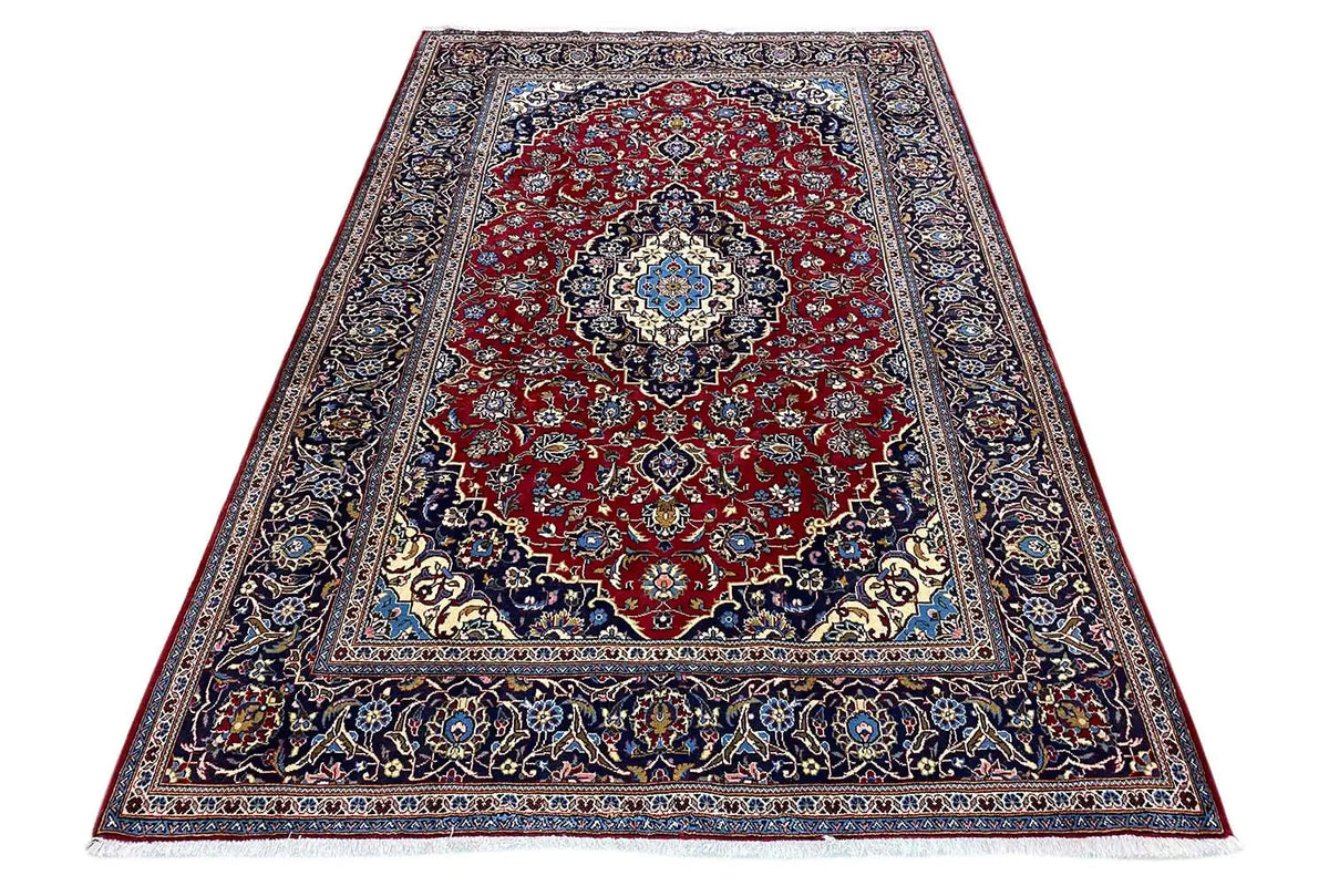 Keshan rug, flat-weave, red-and-blue medallion, traditional border