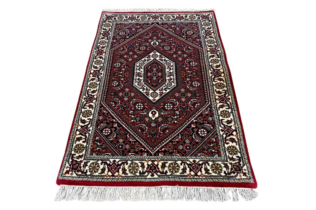 Bidjar rug (94×62 cm): Elegant medallion pattern, red pile, with fringes all around