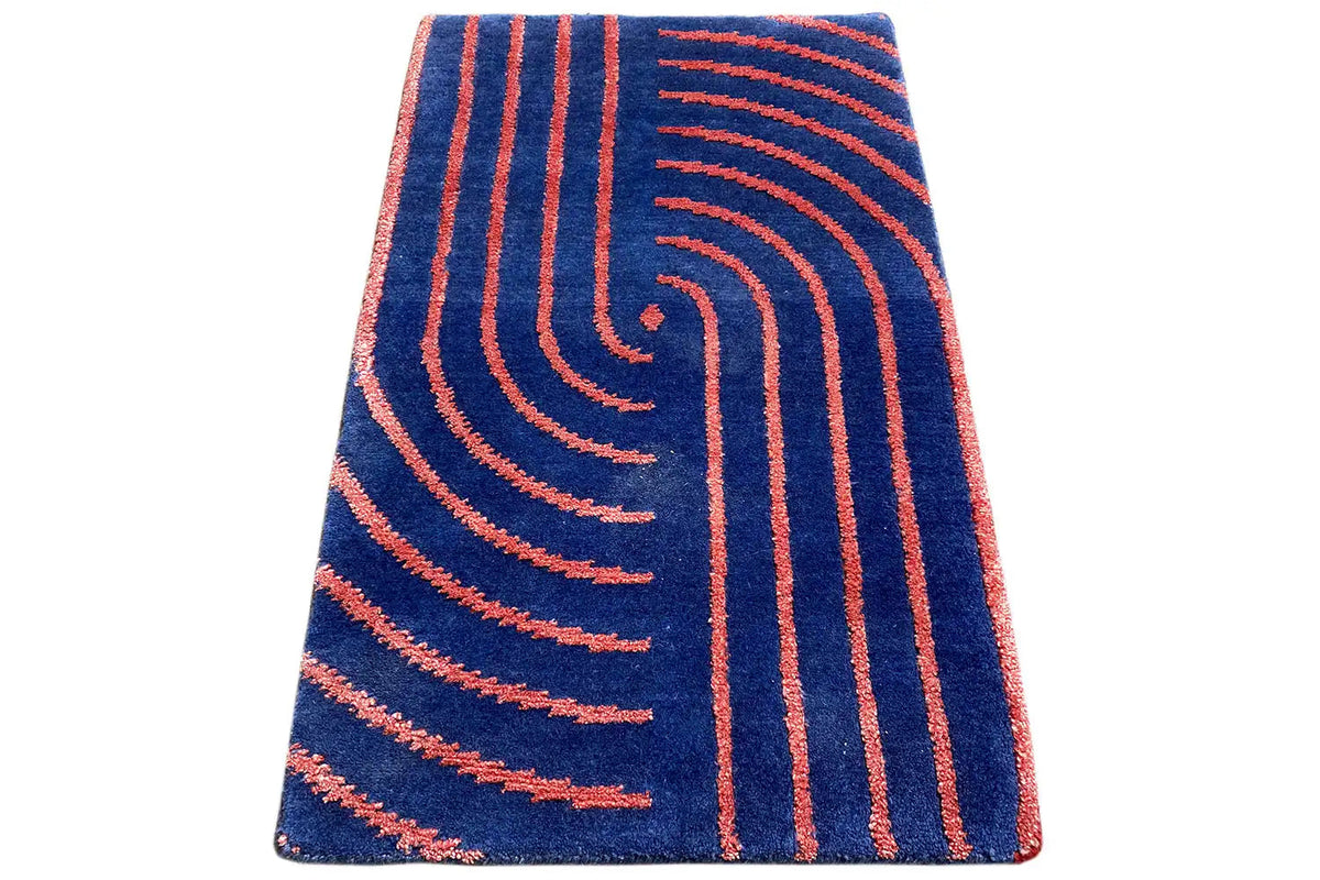 Rug 60x40 cm, blue with orange spiral lines, diagonal