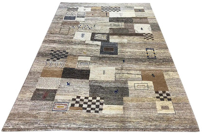 Gabbeh rug, rectangular pattern in shades of gray, beige, and small blue details