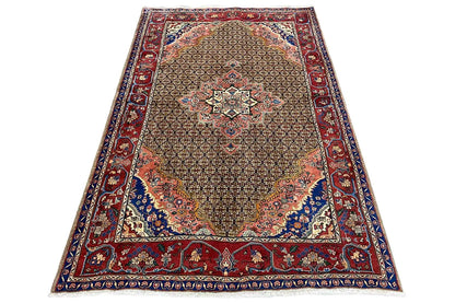 Hamadan rug, beige-brown background with a red border and blue patterned center