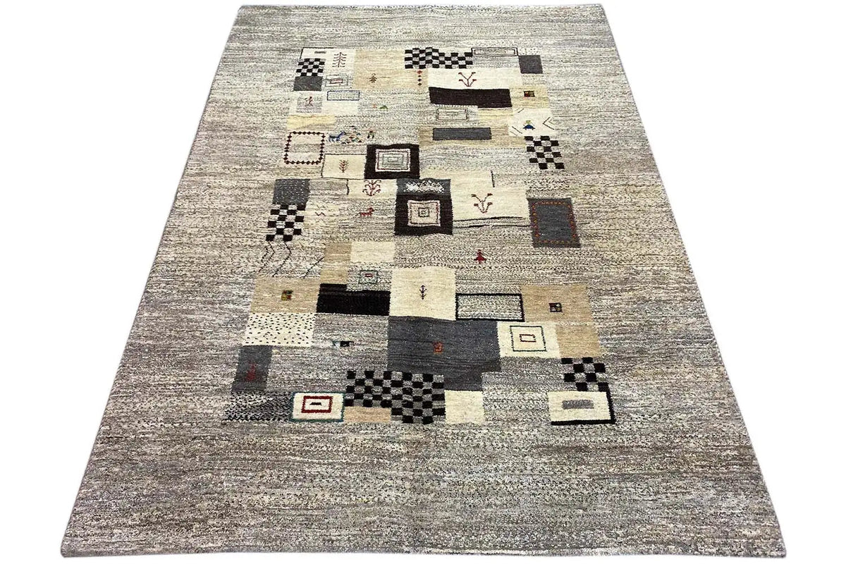 Gabbeh rug 244x173 cm, rectangular surface with patchwork patterns in gray and beige