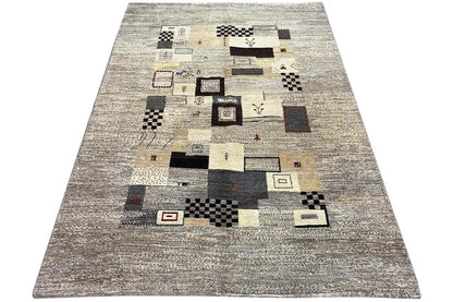 Gabbeh rug 244x173 cm, rectangular surface with patchwork patterns in gray and beige