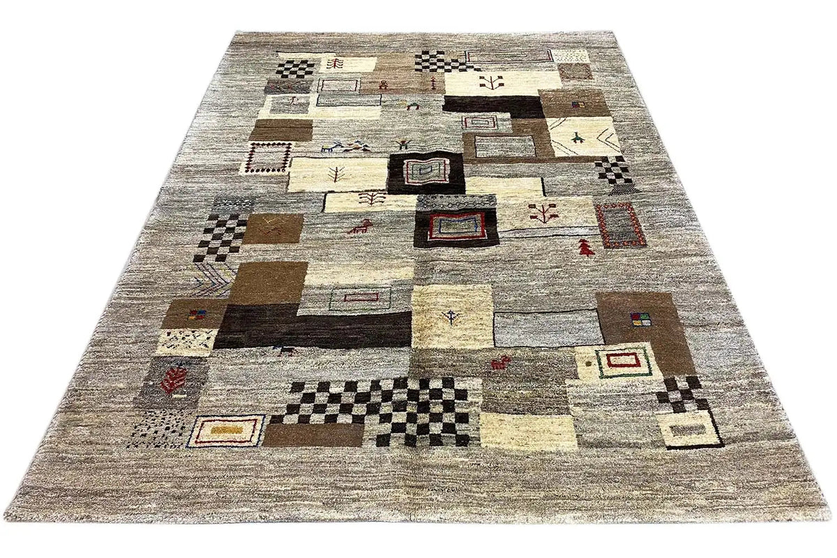 Rectangular Gabbeh rug with an abstract patchwork pattern and diamonds in beige and dark brown