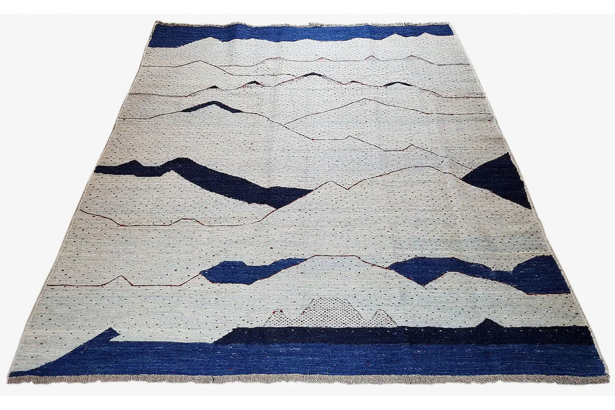 Kilim rug with curved lines and blue accents on a light background