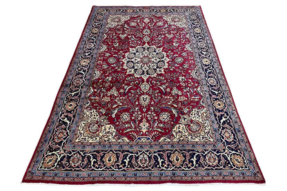 Khorasan rug, rectangular: red pattern with central medallion and decorative border.