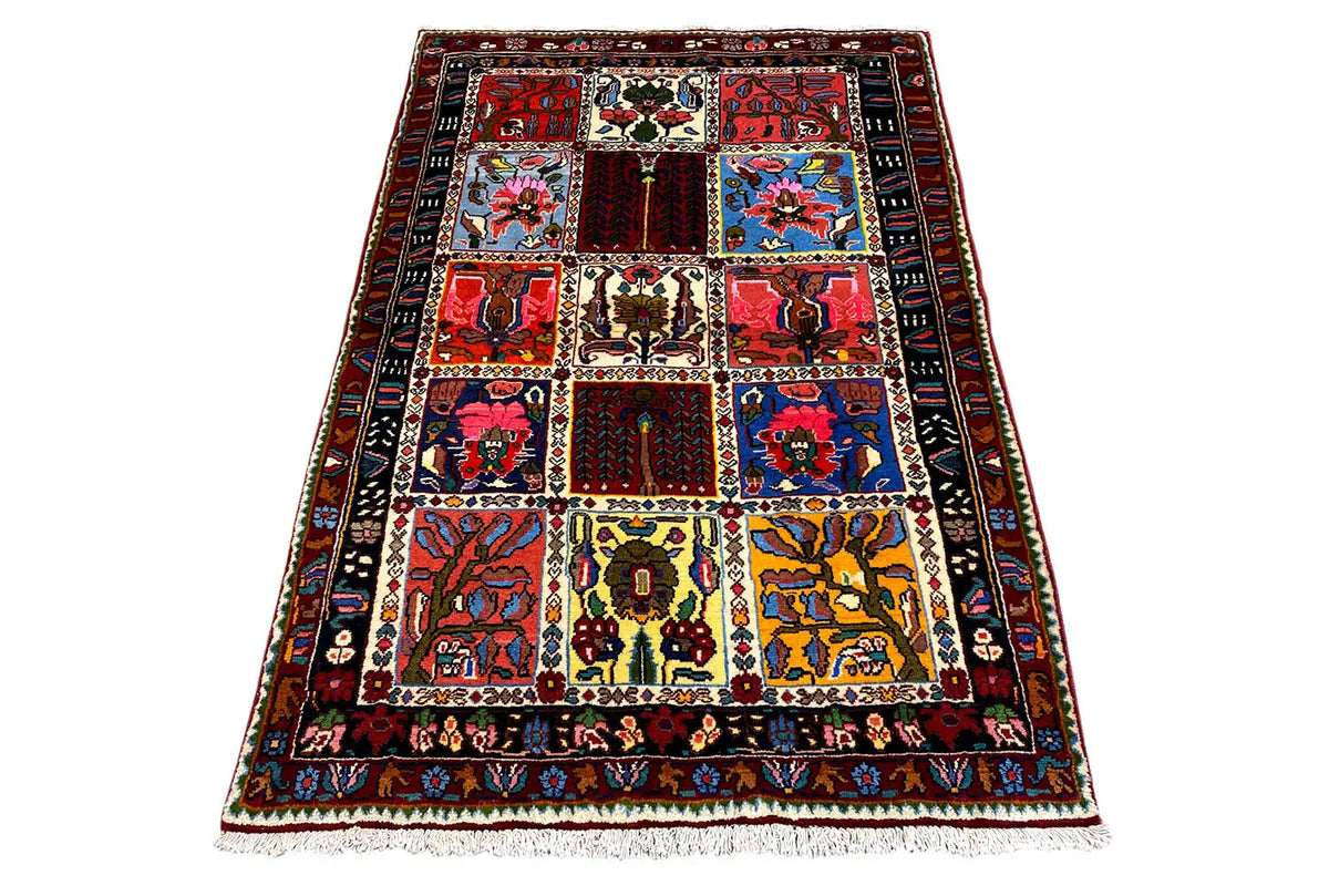 Colorfully patterned rug with square-looking sections, even border