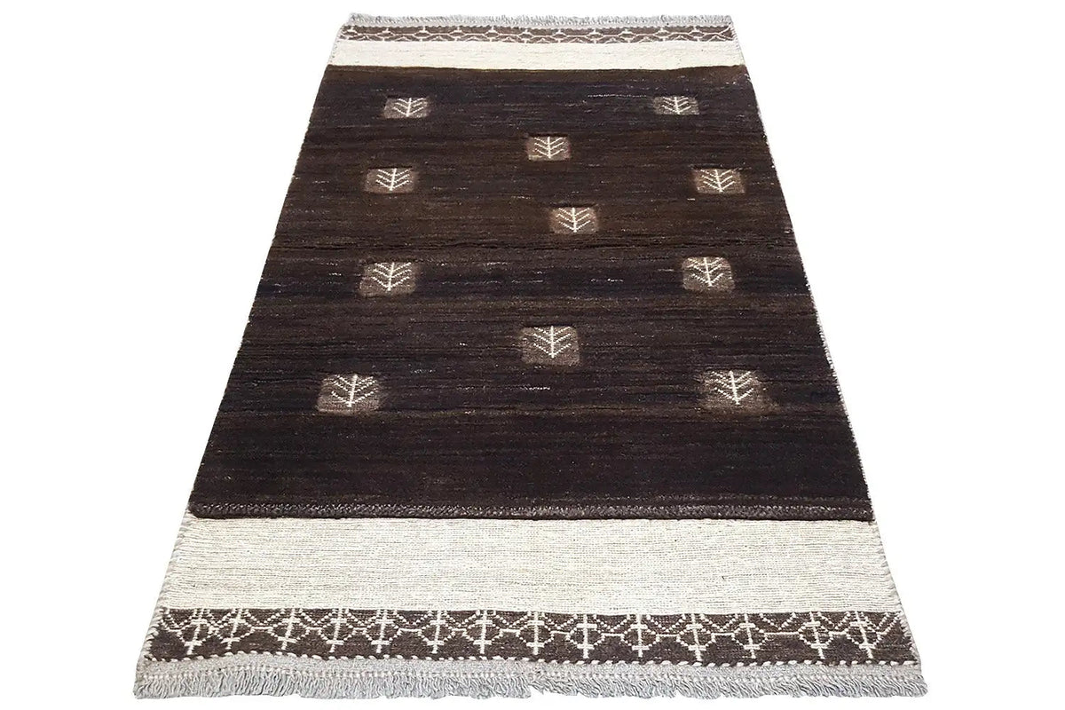Gabbeh rug (163x92 cm) dark brown, light contrasting border, diagonal view