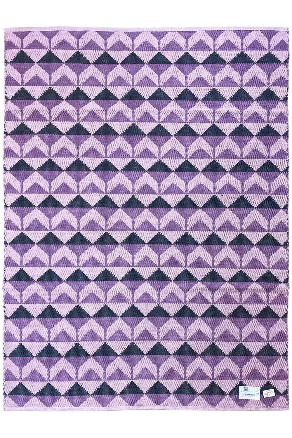 Rectangular kilim with purple, white, and dark blue striped patterns