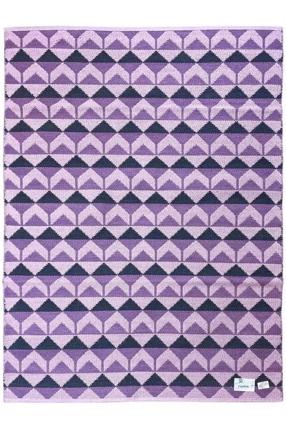 Rectangular kilim with purple, white, and dark blue striped patterns