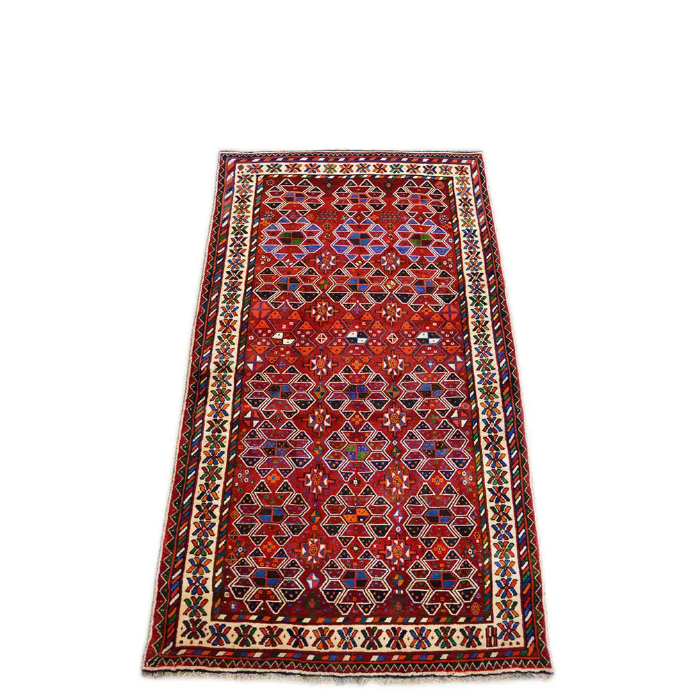 Rectangular Shiraz rug with a red field and multicolored ornamental border