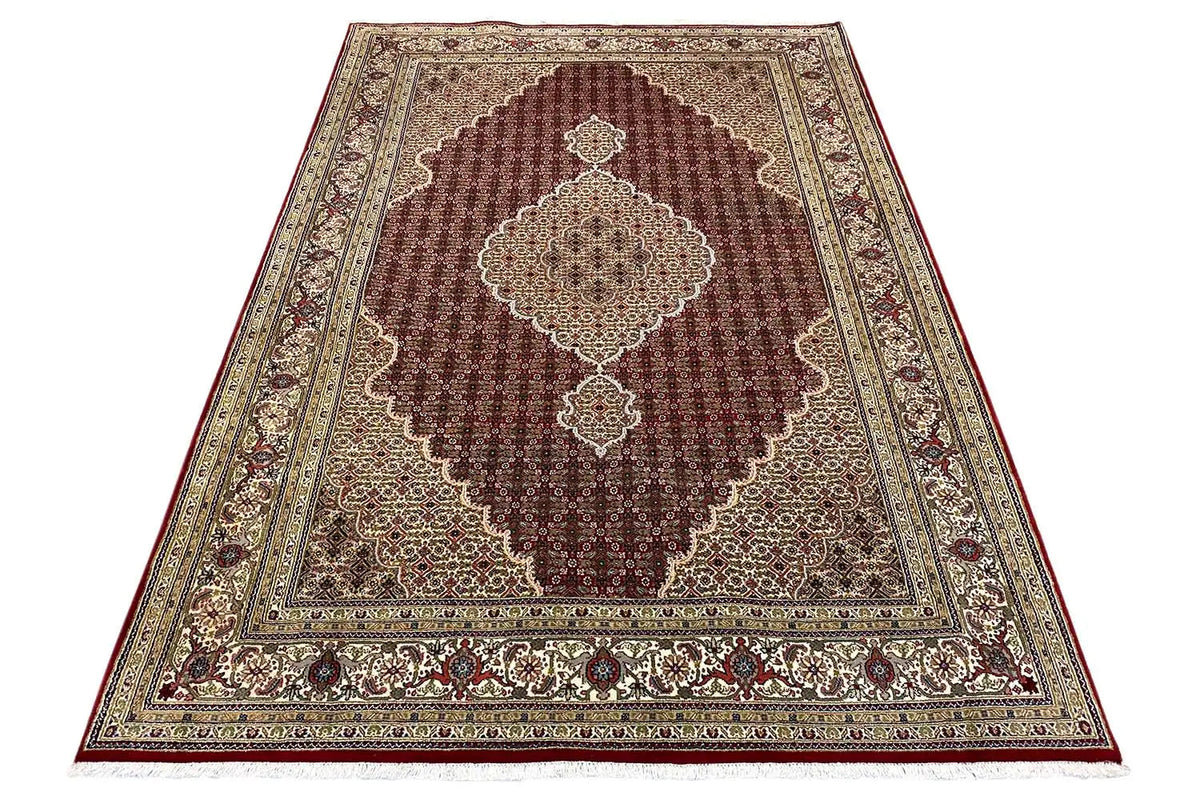 Indo Tabriz rug, burgundy field with medallion and framed pattern