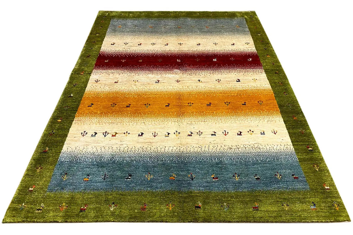 Gabbeh-Lori rug, edged in green with horizontal stripes in blue, red, and orange.