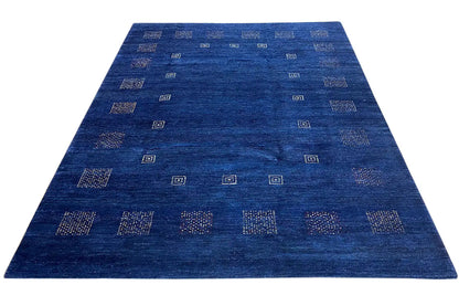 Blue carpet viewed from above with evenly spaced square patterns