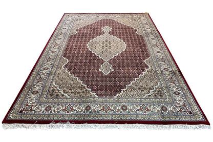 Indo-Tabriz carpet, laid out, large brown medallion in a beige border