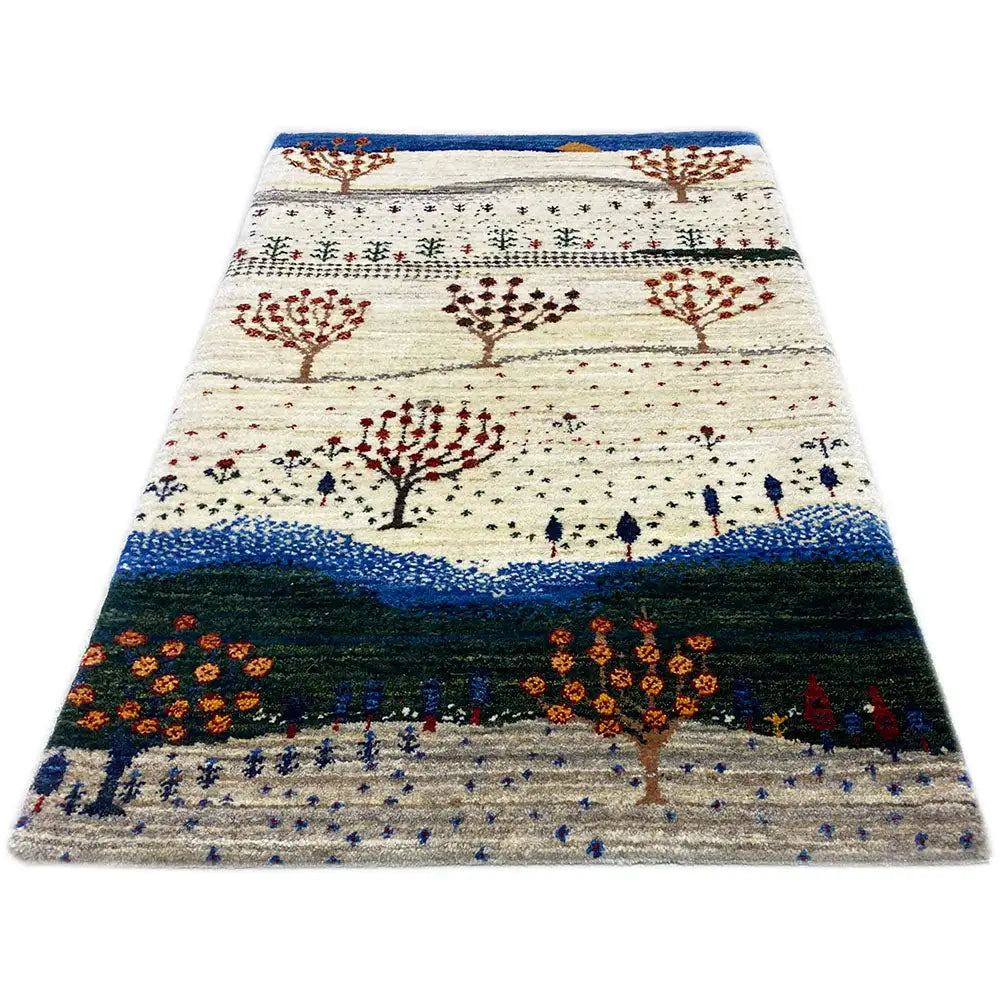 Gabbeh rug 88x59 cm with tree motifs, a cream-colored base, and a blue border