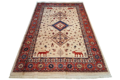 Qashqai exclusive rug, rectangular with fringes and a cream-colored field, red border pattern