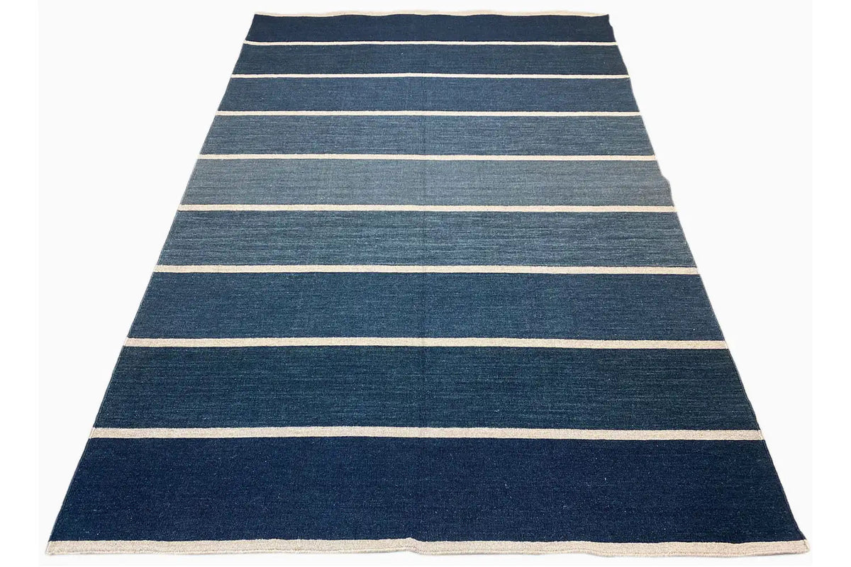 Modern kilim with horizontal stripes in dark blue and light beige, rectangular