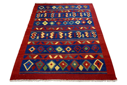 Red and blue kilim rug with rows of geometric motifs