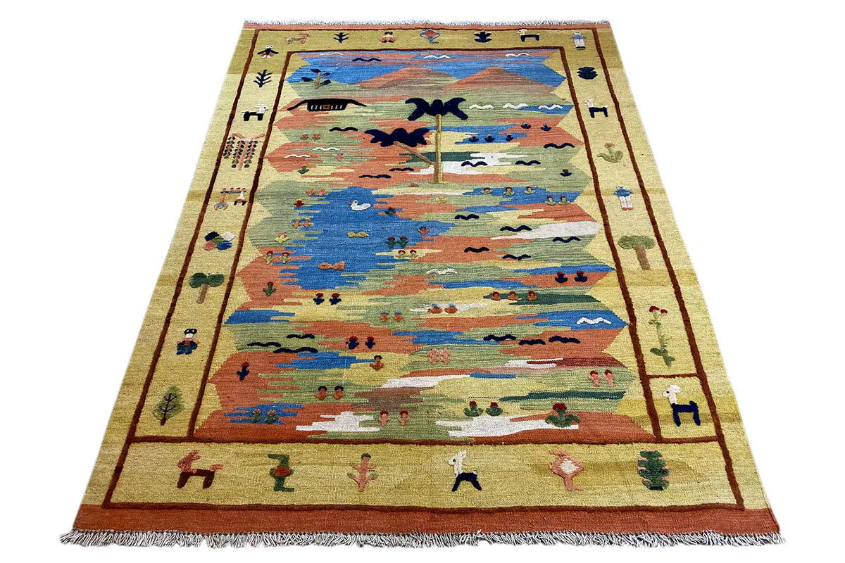 Rectangular kilim rug with a landscape motif, colorful border, and fringes