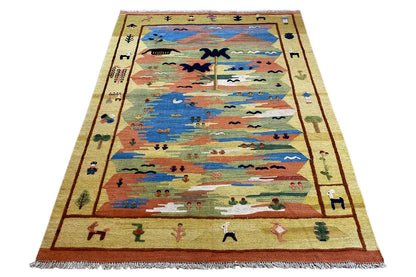 Rectangular kilim rug with a landscape motif, colorful border, and fringes