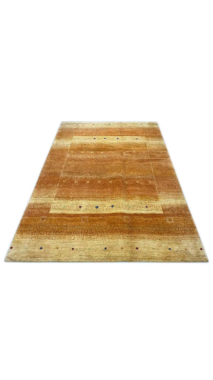 Gabbeh rug, laid out in a trapezoidal shape, striped pattern in honey brown and beige