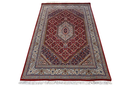 Carpet 186x123 cm with red medallion, gray-blue border, and fringes