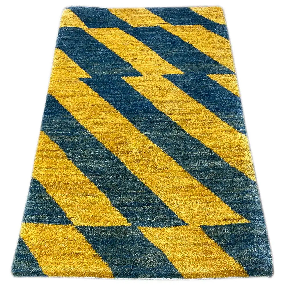 Gabbeh rug made of virgin wool with yellow and blue zigzag stripes