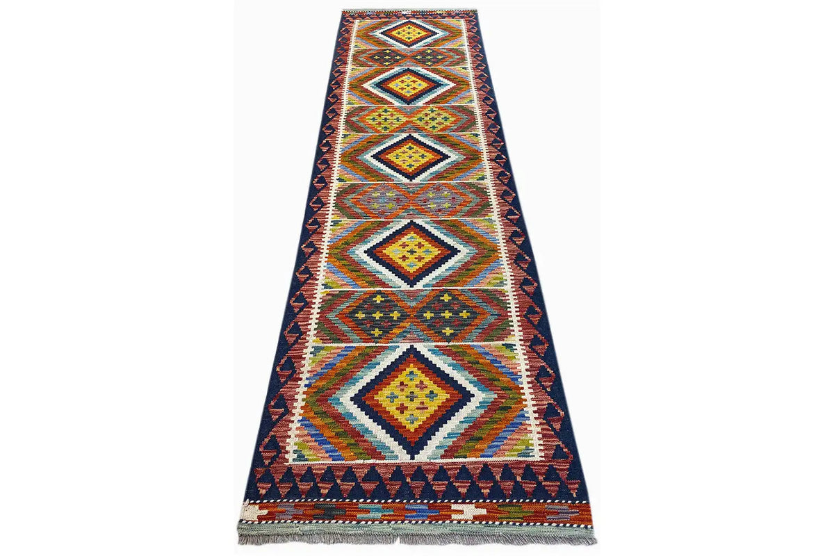 Kilim runner, narrow rug with a geometric central design in blue, yellow, and orange