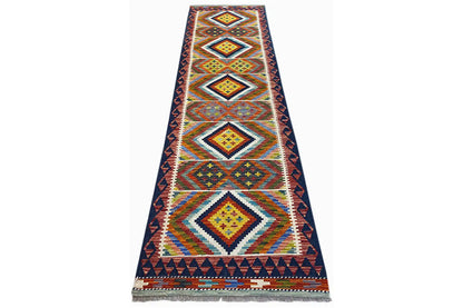 Kilim runner, narrow rug with a geometric central design in blue, yellow, and orange