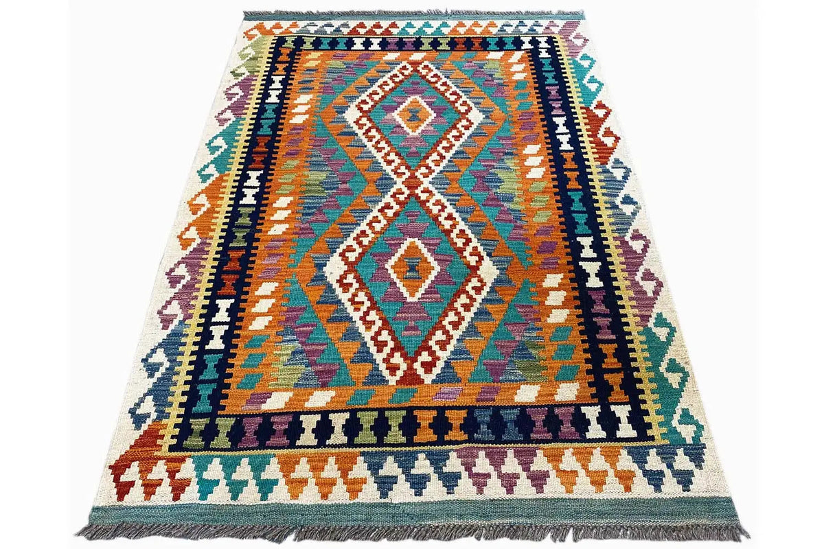 Afghan kilim with a diamond pattern, multicolored geometric design, and fringe along the edge