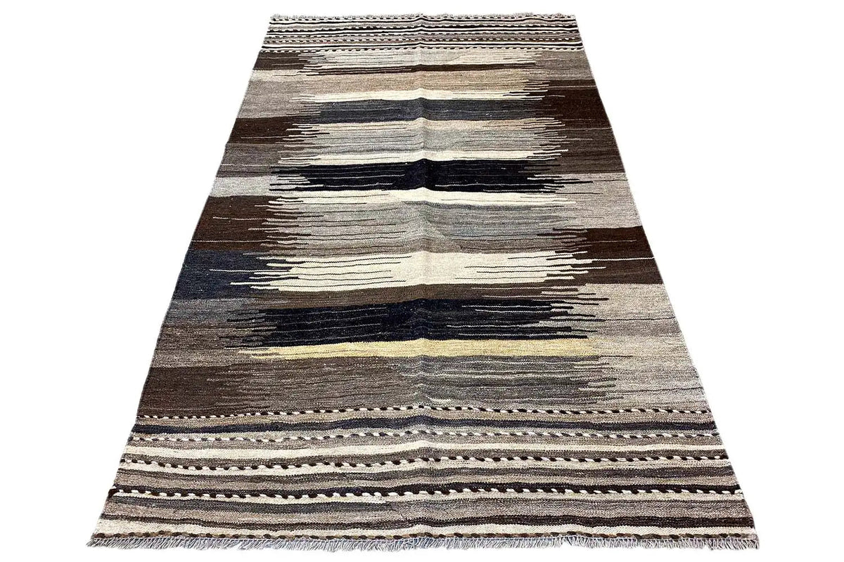 Kilim rug with graphic horizontal stripes in gray, brown, and cream, flat-woven