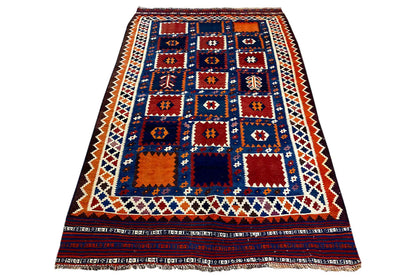 Kilim rug with a central diamond field in blue, red, orange, and white, with a wide border.