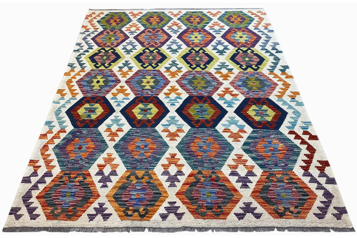 Afghan kilim rug in a triangular view with colorful tile patterns