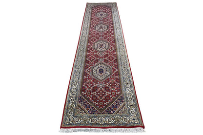 Bidjar runner with an oriental diamond pattern in burgundy and beige, front view