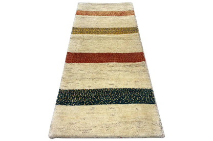 Landscape-format Gabbeh rug with stripes in beige, red, dark green, and brown