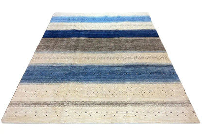 Gabbeh Lori rug: beige field with broad blue-gray stripes and small dotted patterns.