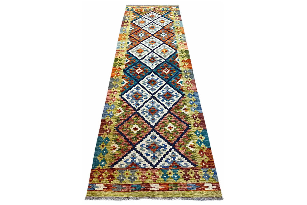 Slanted kilim runner: colorful diamond and medallion patterns, rectangular