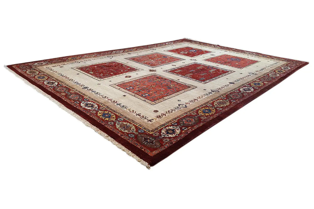 Rug with a cream-colored background, red and blue tile motifs, and a wide border
