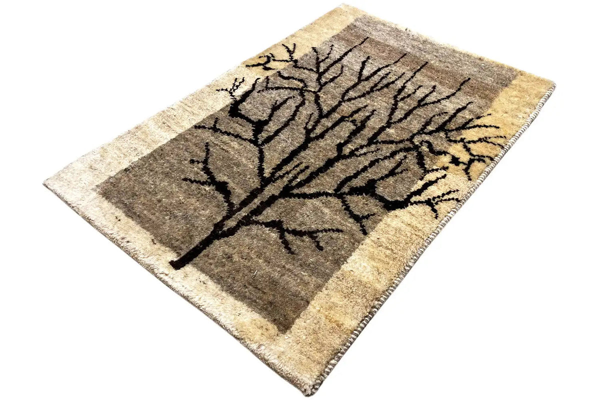 Gabbeh rug 80x57 cm, lying at an angle: tree motif, beige pile, black lines