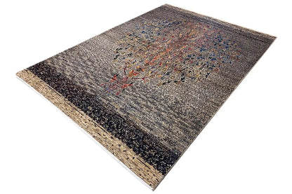 Gabbeh rug Lori 220x154 cm laid at an angle; gray field with a colorful central motif
