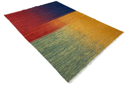 Kilim rug laid out, diagonal stripe pattern in dark blue, red, yellow and green