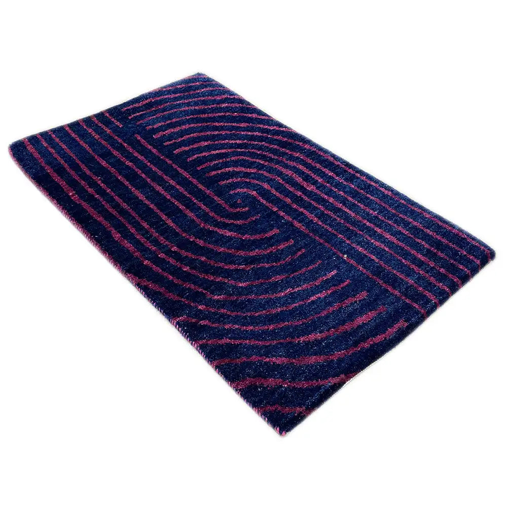 Gabbeh rug, rotated: curved line patterns in dark blue and pink